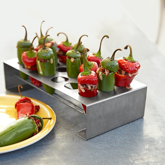 Stuffed peppers are delicious and super simple to make on the grill with this BBQ safe holder.