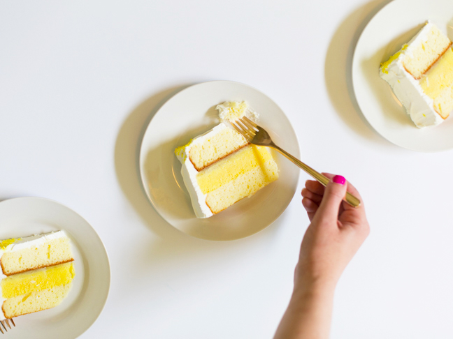 gold fork eating ice cream cake