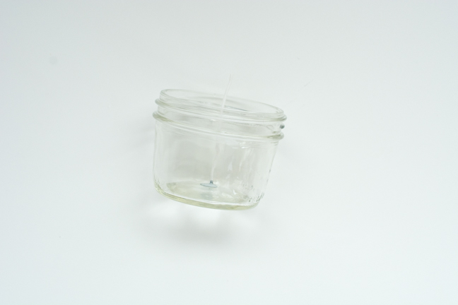small mason jar with wick