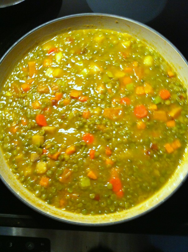 pot of soup carrots peas