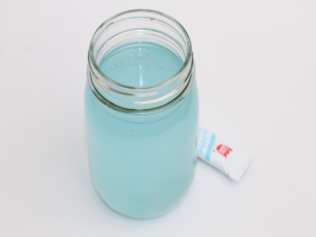 mason jar with blue water