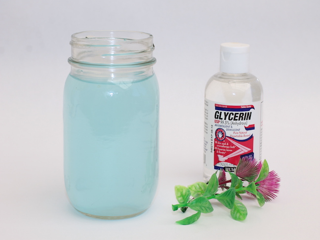 mason jar with blue water and glycerin