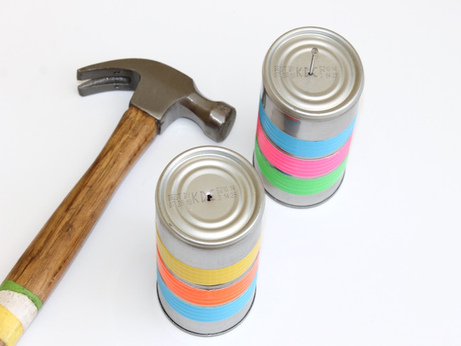 tin cans with hammer