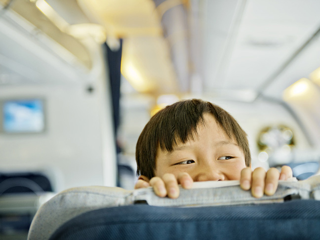 child-international-flight-plane-asian-seat