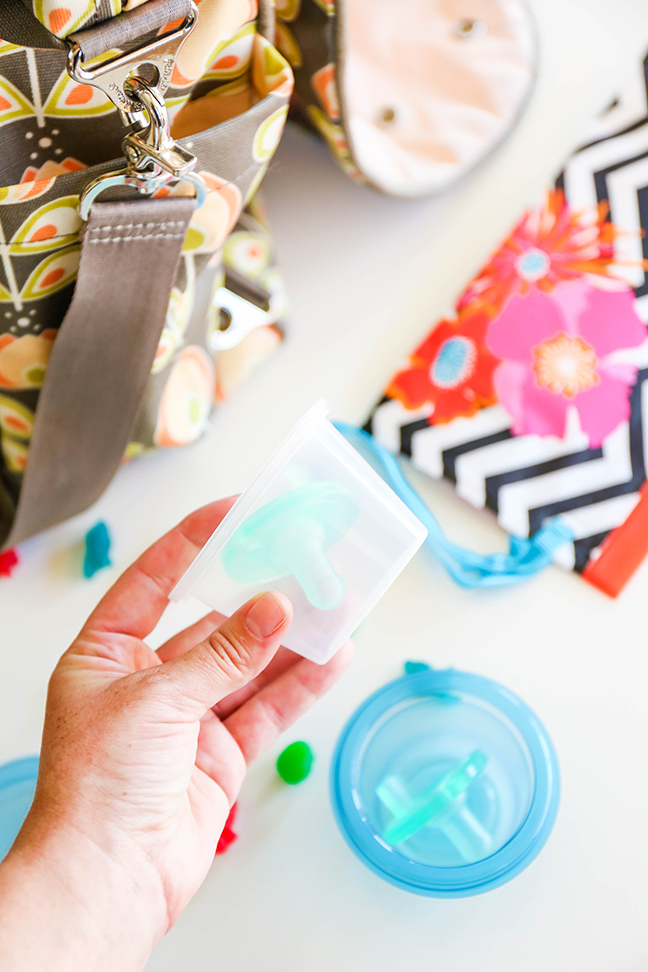 protect binkies and pacifiers with mini food containers in the diaper bag \\ Toddler Proofing Tricks You've Never Heard of Before