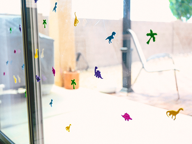 Prevent toddlers from running into glass doors by adding stickers and decals \\ Toddler Proofing Tricks You've Never Heard of Before