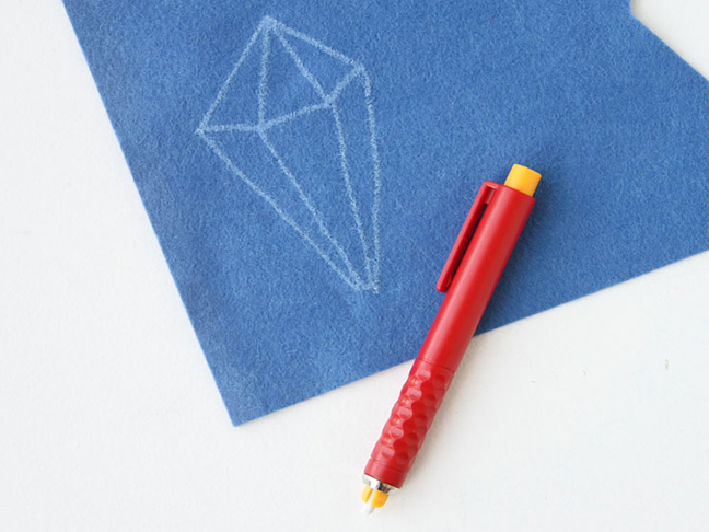 Draw the outline of the geometric shape  in chalk