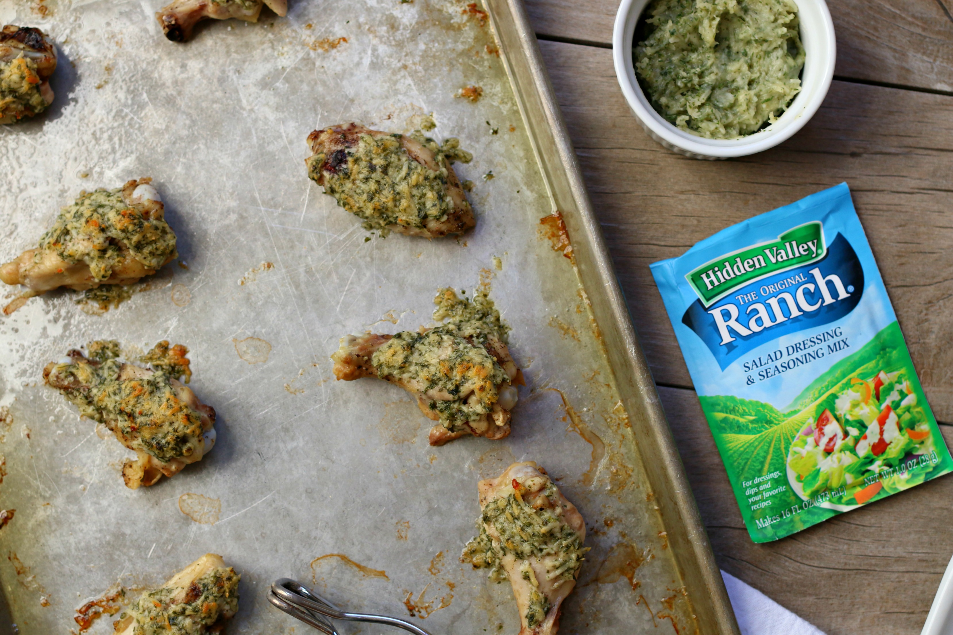 garlic parmesan ranch chicken wings on baking sheet