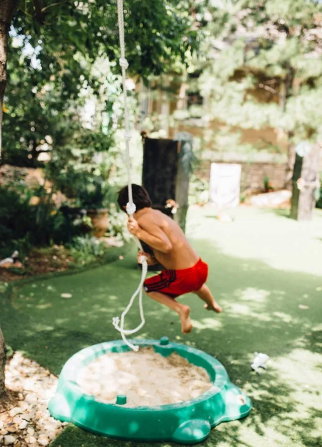 rope-jump-boy-outside-obstacle-course