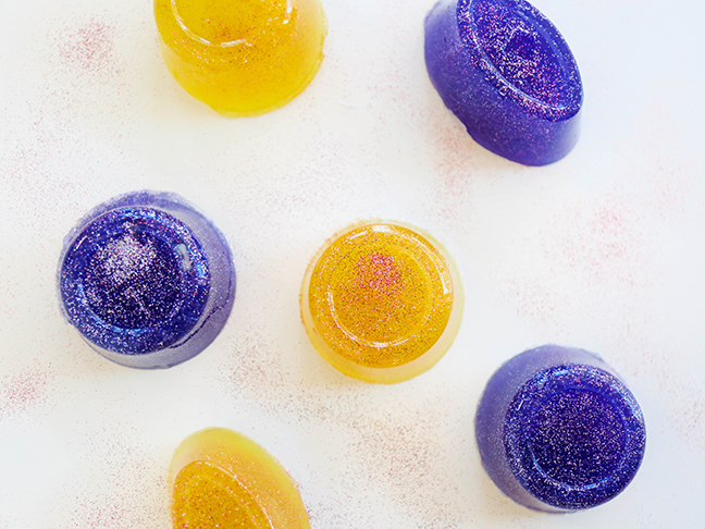 purple and yellow jelly soaps with glitter
