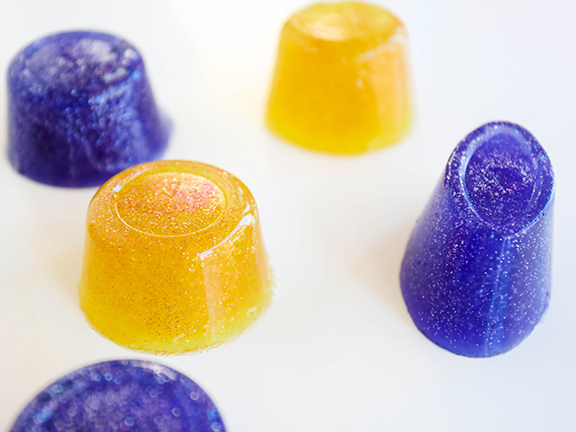 gumdrop shaped purple and yellow glitter soaps