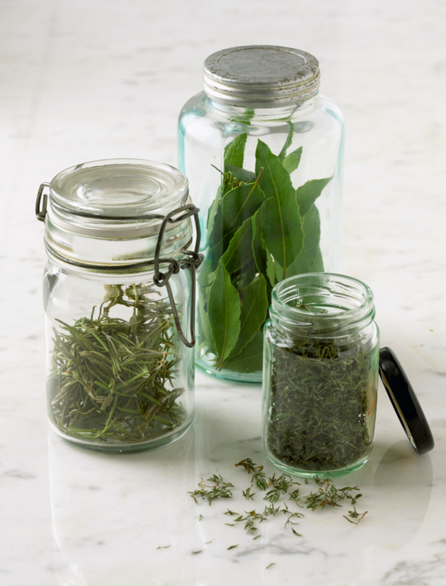 green herbs glass jars
