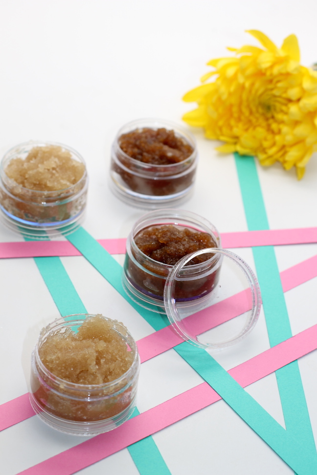 brown lip scrubs in plastic containers