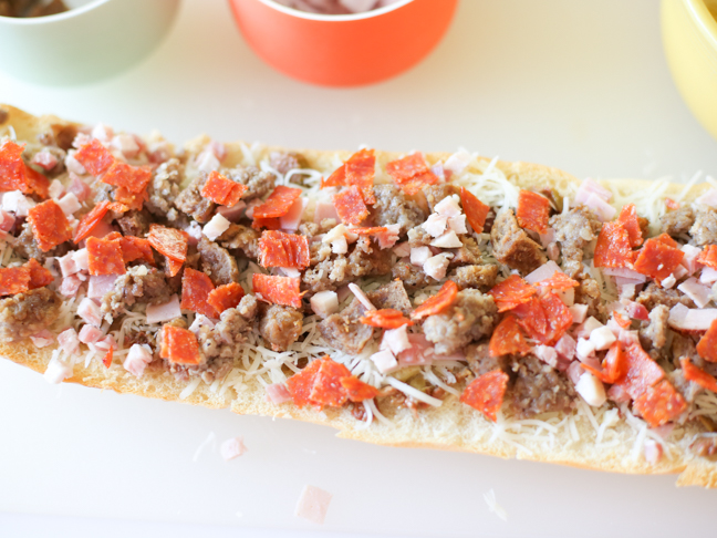 meat on garlic bread pizza