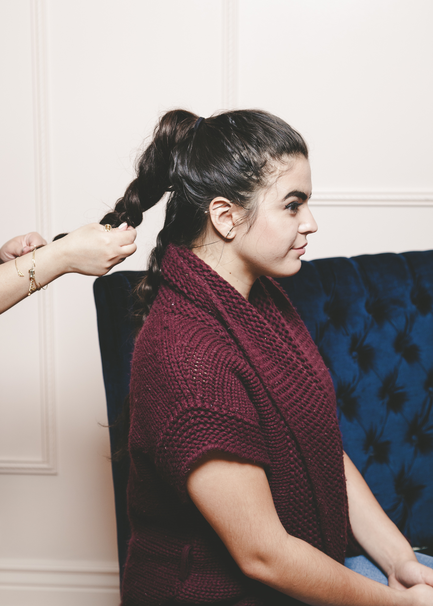 braiding a ponytail