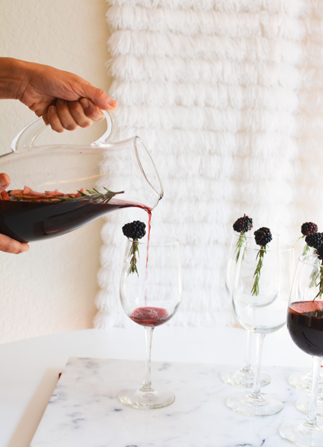 pouring wine wine sangria into wine glasses