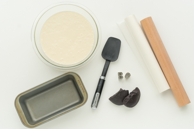 cake pan batter in glass bowl rolling pin