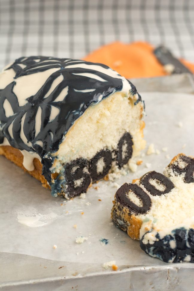 boo cake with spiderweb icing