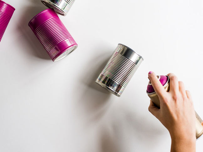 Spray cans with spray paint