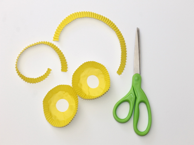 yellow cupcake liner eyes green scissors