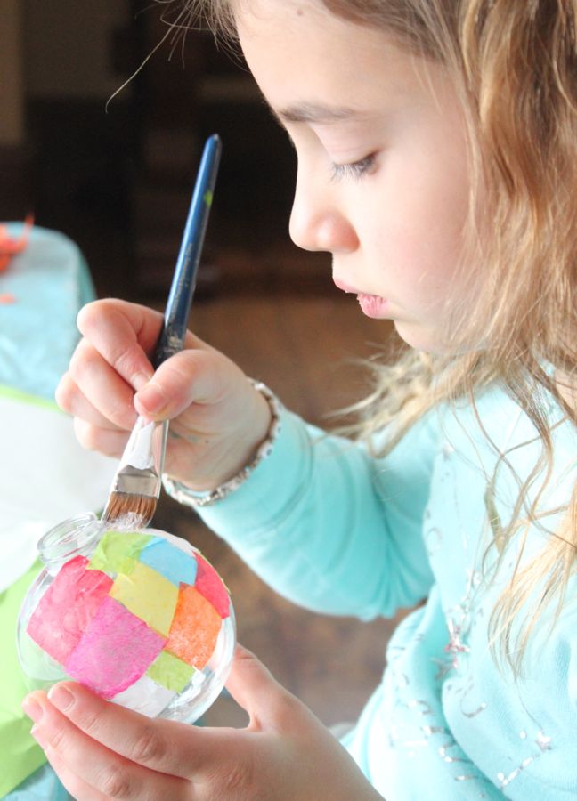 girl-painting-art-project-with-colorful-tissue-paper