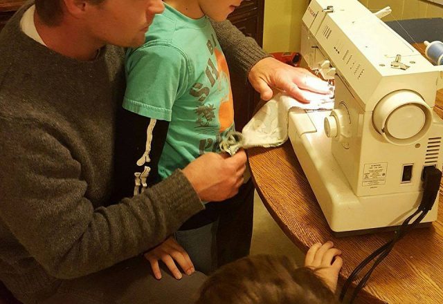 Housewife-Plus-Dad-teaching-sons-to-sew-640x440
