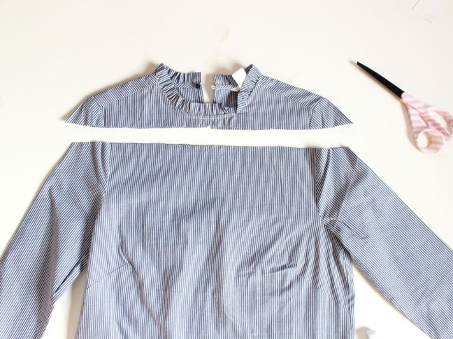 cut-blue-and-white-striped-shirt-scissors