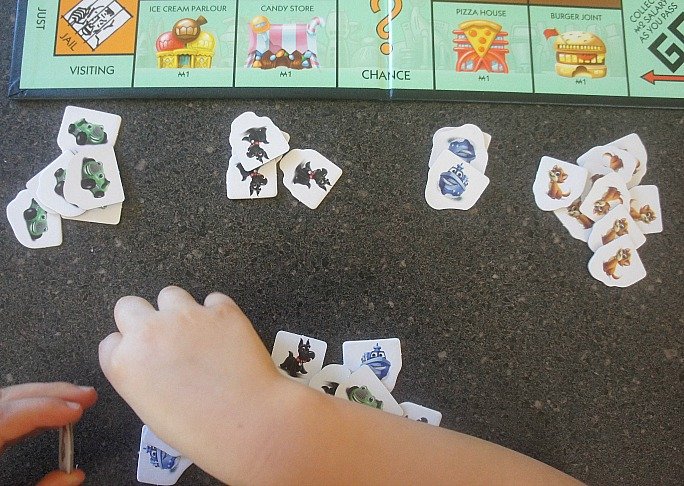 Sorting tokens for play with Monopoly Junior