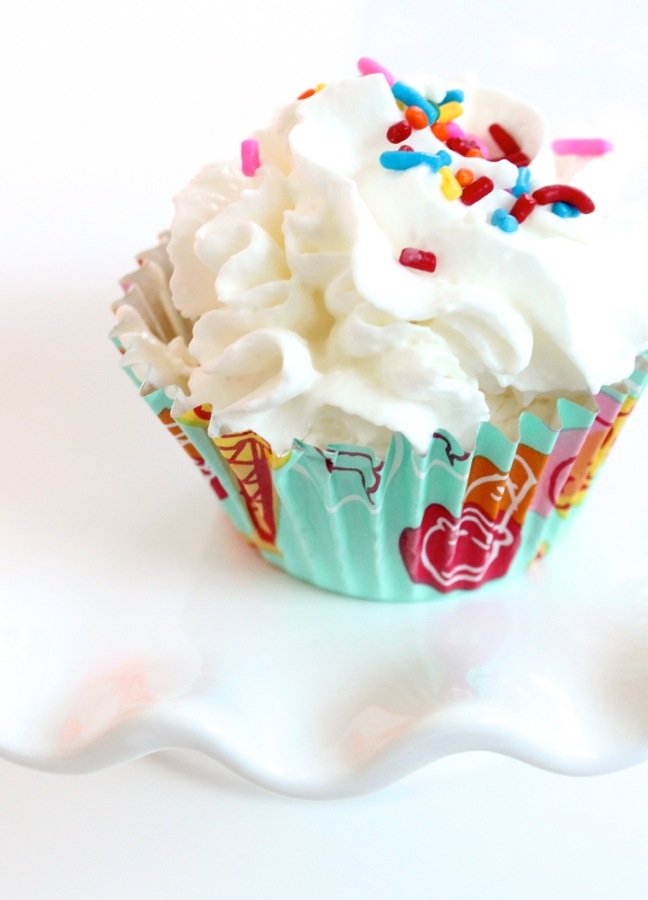 ice-cream-cupcake-with-whipping-cream-and-sprinkles