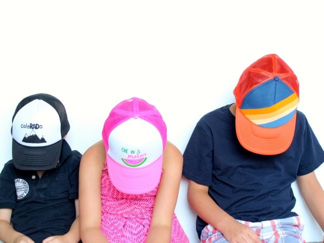 kids-wearing-diy-trucker-hats-with-a-watermelon-mountain-scene-and-orange-and-blue-rainbow