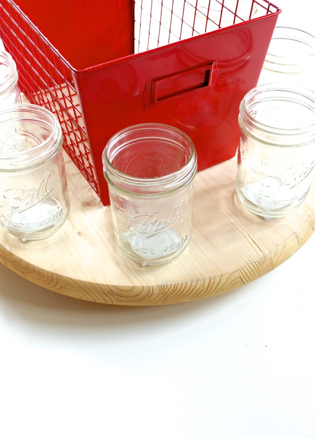 red-basket-with-mason-jars-on-a-round-wood-pine-lazy-susan