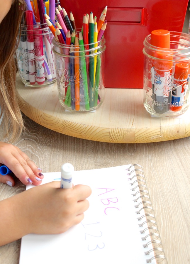 girl-doing-homework-with-a-lazy-susan-homework-station