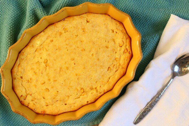 Sweet Corn Spoon Bread--a perfect Thanksgiving side dish! Sweet corn spoon bread is a southern dish that is a cross between corn bread and a sweet dessert. It's more like a pudding than a bread. It's so soft, it can be served and eaten with a spoon.