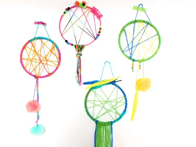 colorful-pink-yellow-blue-green-dream-catcher-for-kids-pom-poms-feathers-sweet-dreams