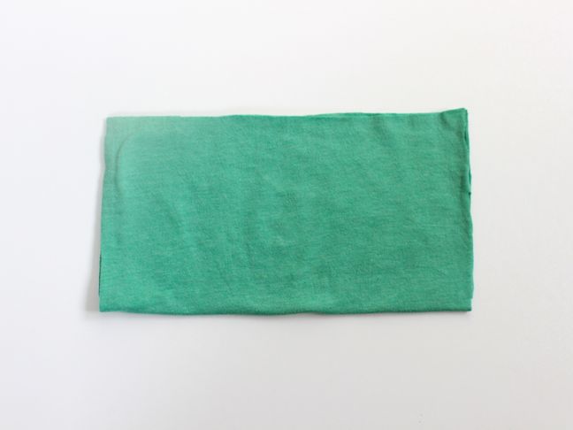 green-tee-folded-in-half