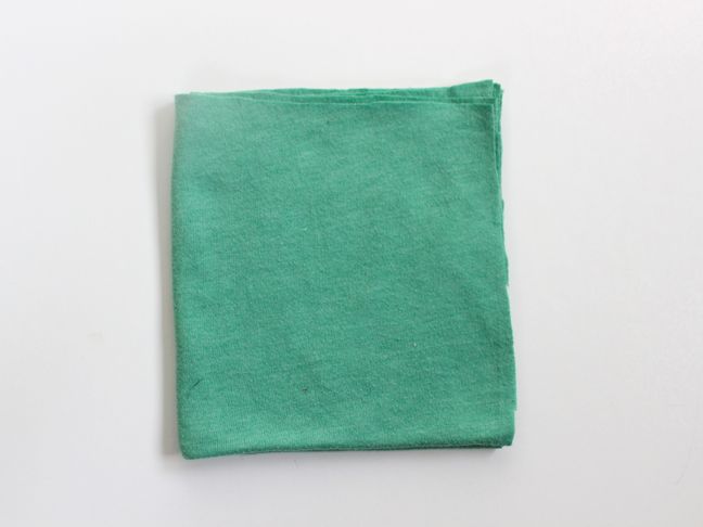 green-shirt-folded-into-a-square