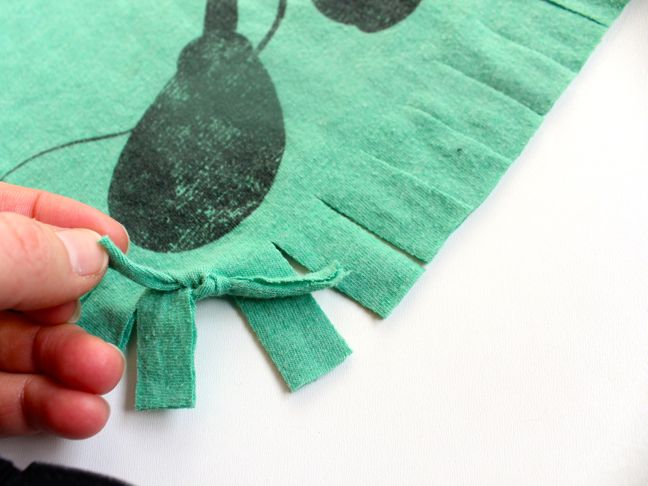 green-mickey-shirt-with-knots-along-the-edges