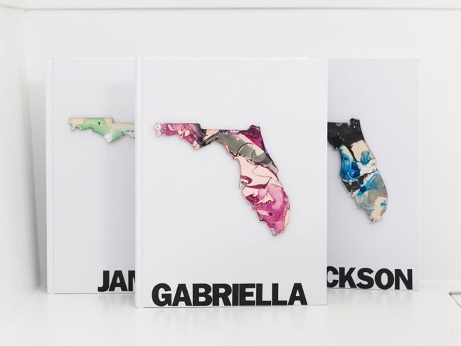 white-scrapbooks-with-marbled-florida-cut-outs