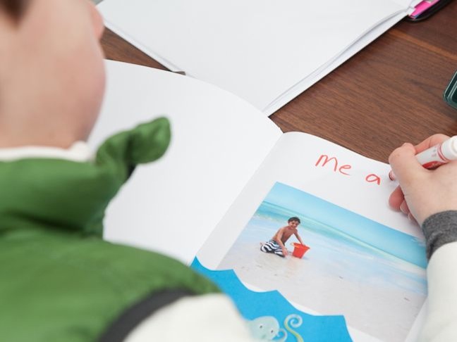 boy-scrapbooking-a-beach-vacation