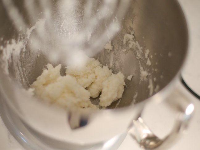 Shortening and sugar in a mixing bowl