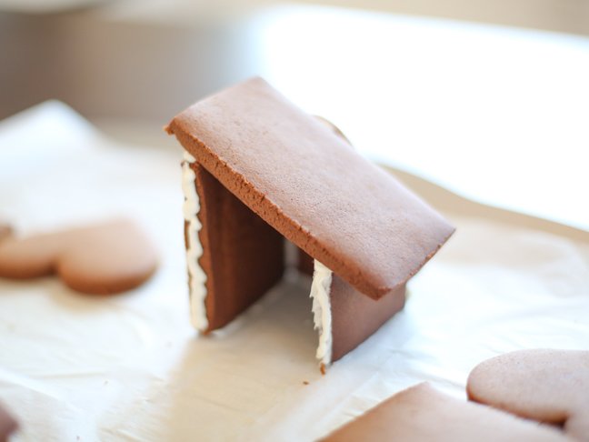 Half-assembled gingerbread house for Valentine's Day