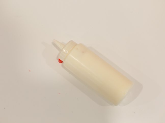 Icing bottle with icing