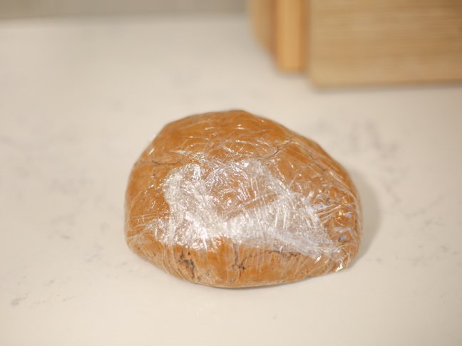 Wrapped and resting gingerbread dough