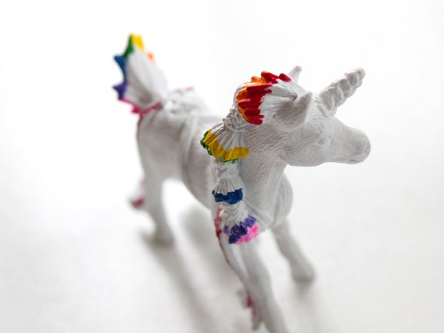 white-toy-unicorn-with-rainbow-hair