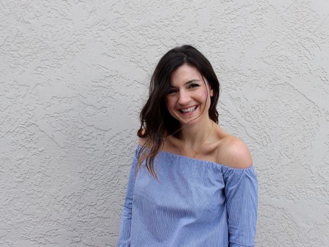 woman-wearing-a-blue-and-white-striped-off-the-shoulder-shirt