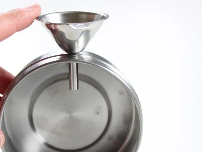 metal-funnel-inside-a-round-ikea-stainless-steel-container