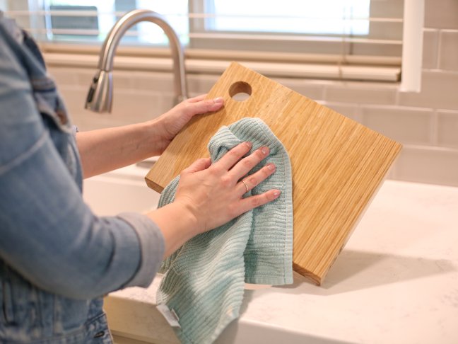 hands-drying-cutting-board