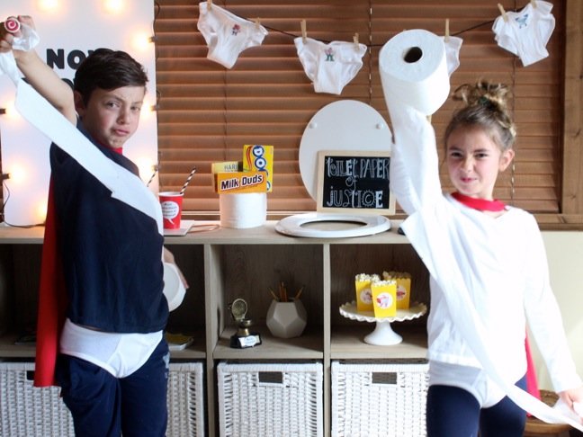 boy-and-girl-plating-with-toilet-paper-at-a-captain-underpants-party
