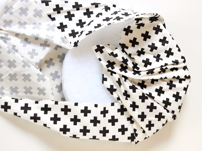 black-and-white-cross-fabric-covering-a-foam-circle