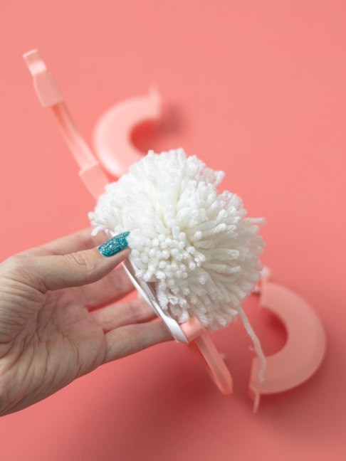 Kids will Love Having an Indoor Snowball Fight with Pom Poms!